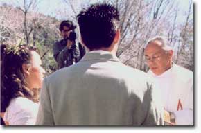 Father Joshua facilitating a wedding