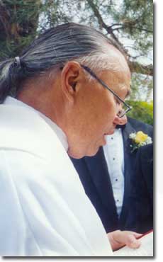 Father Joshua facilitating a wedding